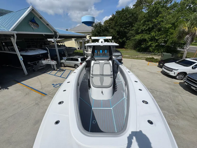 Slide: The Image of Power-Pole anchor system on 2023 Front Runner 36 Center Console boat deck. - 19