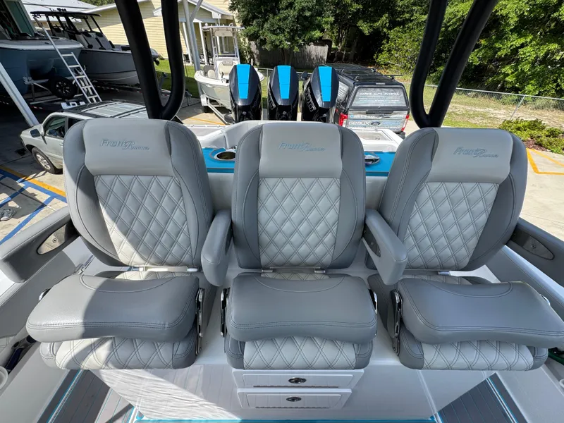 Slide: The Image of 2023 Front Runner 36 Center Console boat with Garmin navigation system and sleek design. - 30