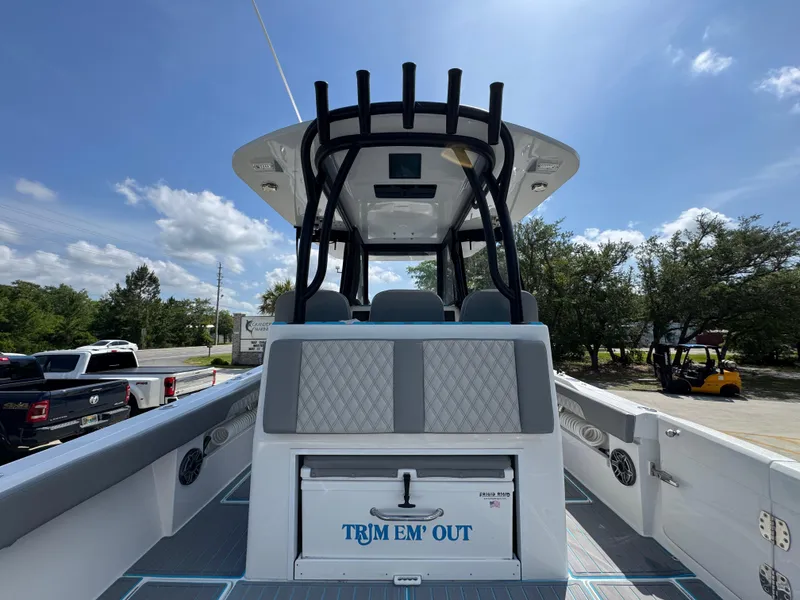 Slide: The Image of 2023 Front Runner 36 Center Console with luxurious gray seating and sleek steering wheel. - 34