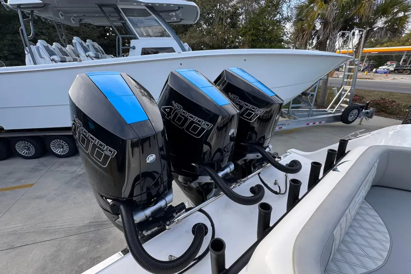 Slide: The Image of 2023 Front Runner 36 Center Console with triple Mercury Racing 400 outboard engines. - 45