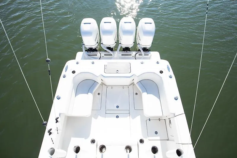 Slide: The Image of 2017 SeaVee 390OZ boat with four engines, viewed from above on water. - 14