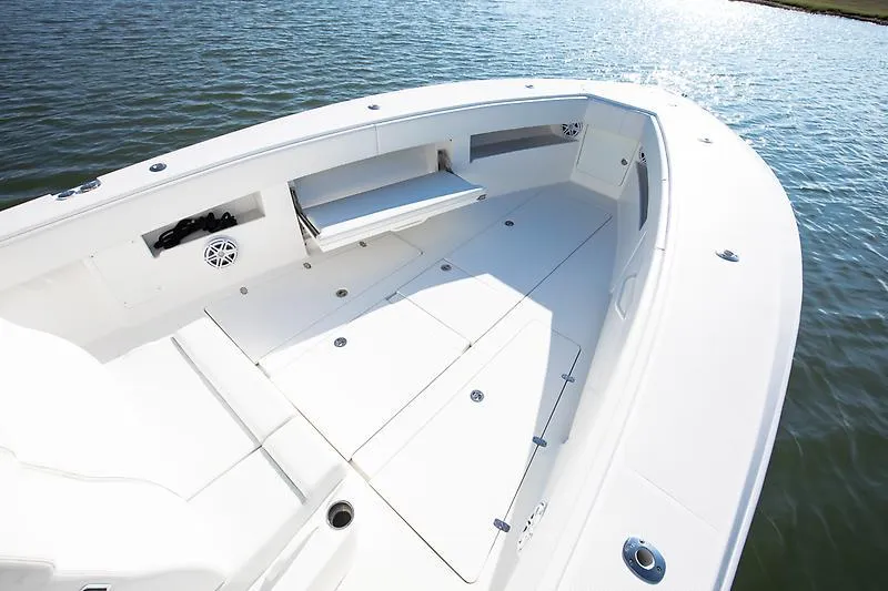 Slide: The Image of 2017 SeaVee 390OZ boat deck, spacious and sleek design on calm water. - 5