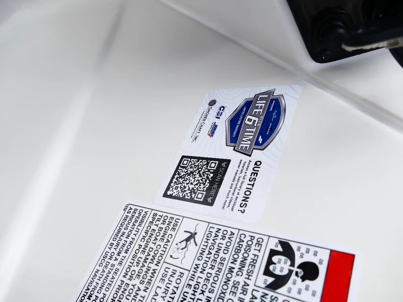 Slide: The Image of 2026 Starcraft SVX 231 OB warranty and safety labels with QR code. - 10