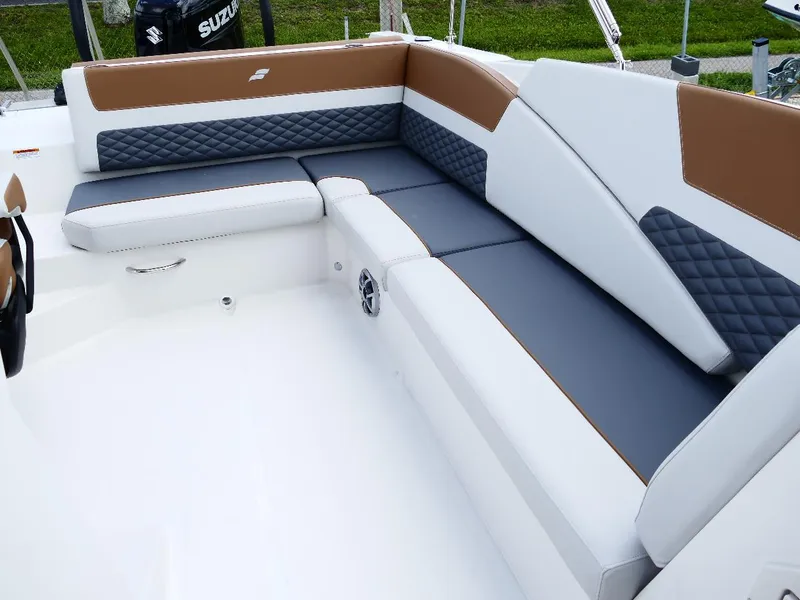 Slide: The Image of 2026 Starcraft SVX 231 OB boat interior with stylish seating and modern design. - 21