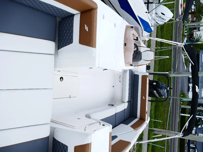 Slide: The Image of 2026 Starcraft SVX 231 OB boat interior with stylish seating and modern design. - 25
