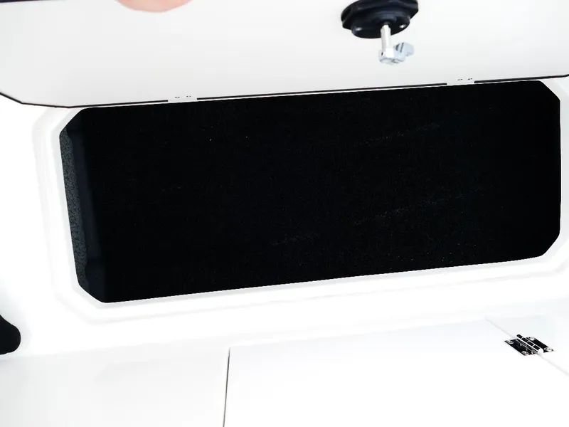 Slide: The Image of Open storage compartment in 2026 Starcraft SVX 231 OB boat. - 34