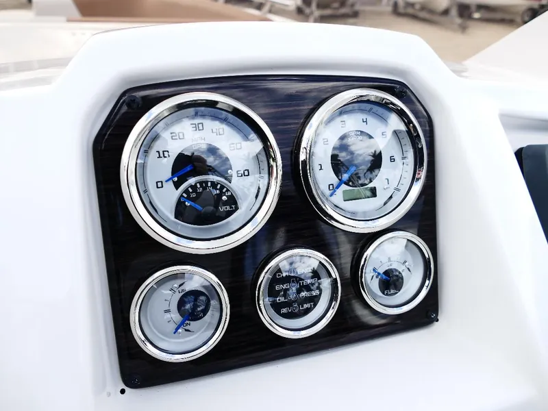 Slide: The Image of Dashboard of 2026 Starcraft SVX 231 OB boat with gauges and controls. - 44