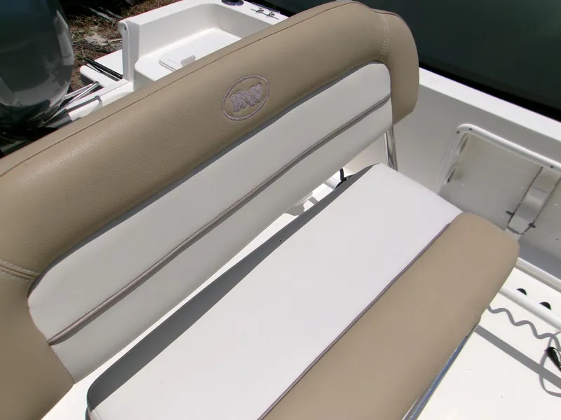 Slide: The Image of 2016 Key West 1720 Center Console boat seat, beige and white upholstery. - 10