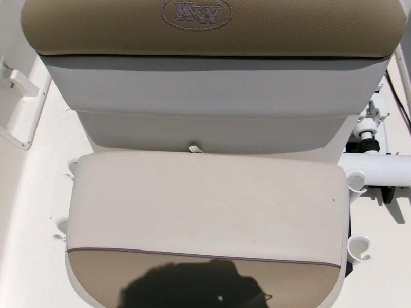 Slide: The Image of Key West 1720 Center Console 2016 boat seat with beige and white upholstery. - 8