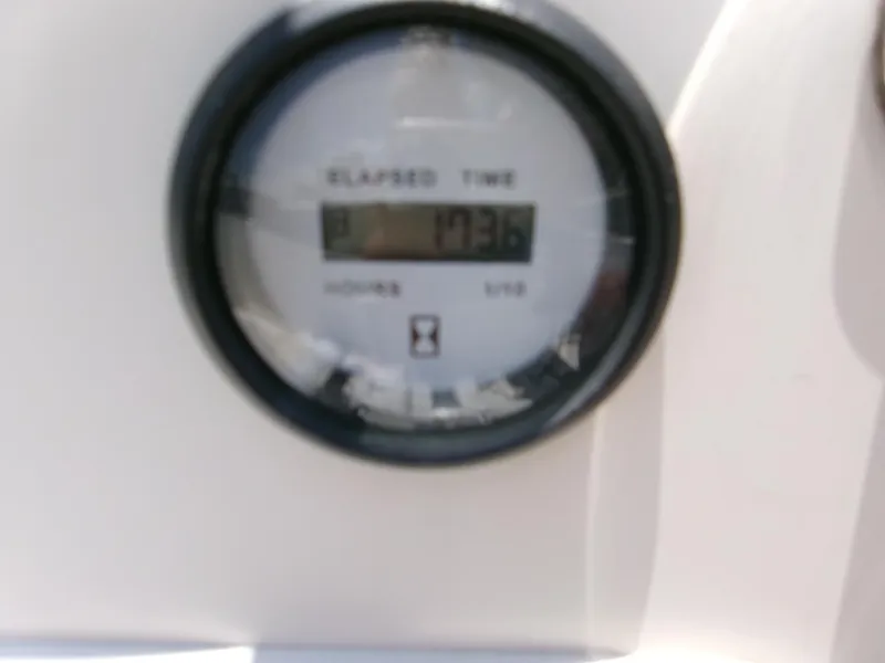 Slide: The Image of Hour meter showing 1036 hours on a 2016 Key West 1720 Center Console boat. - 9