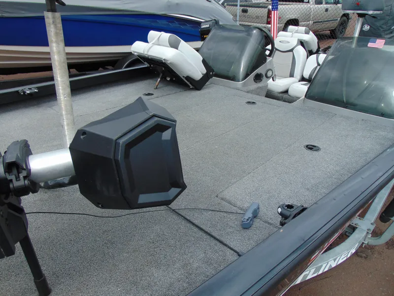 Slide: The Image of 2014 Crestliner VT 19 fishing boat deck with seating and equipment. - 4