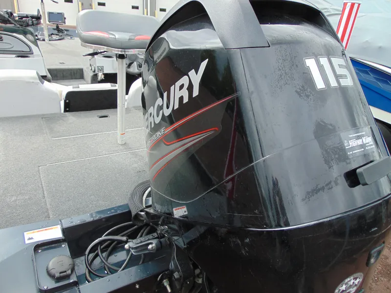 Slide: The Image of 2014 Crestliner VT 19 boat with Mercury 115 outboard motor, rear deck view. - 8