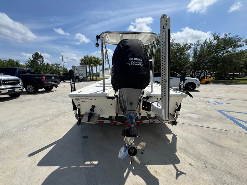 Slide: The Image of 2021 Hewes Redfisher 18 boat with Yamaha engine in parking lot. - 16