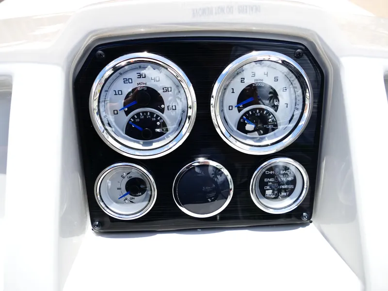 Slide: The Image of Dashboard of 2026 Starcraft SVX 231 OB DH boat with gauges and controls. - 18
