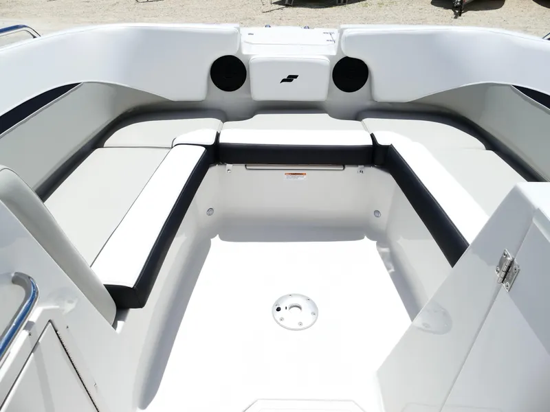 Slide: The Image of 2026 Starcraft SVX 231 OB DH boat interior with white seating and modern design. - 28