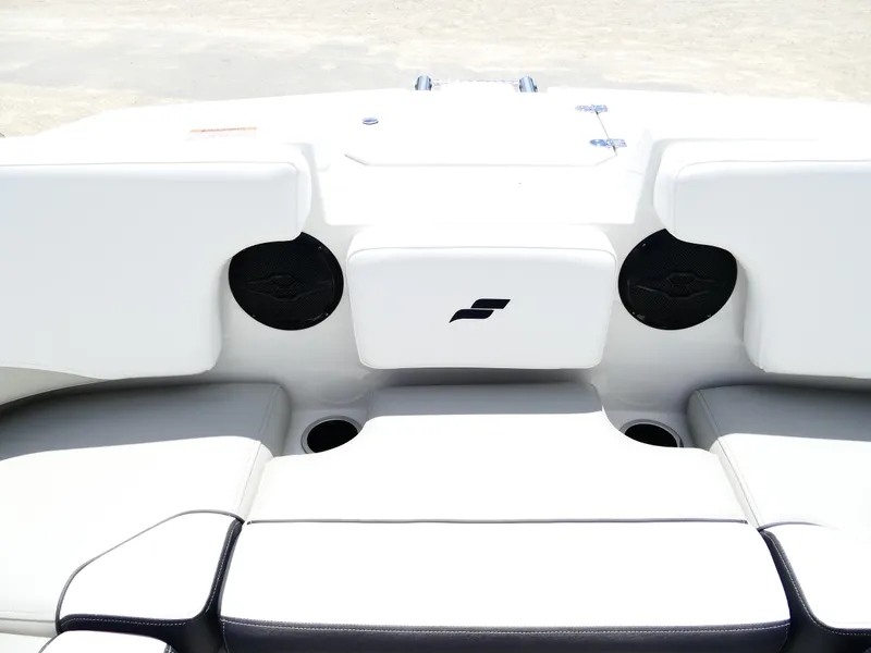 Slide: The Image of 2026 Starcraft SVX 231 OB DH boat interior with white seating and built-in speakers. - 29