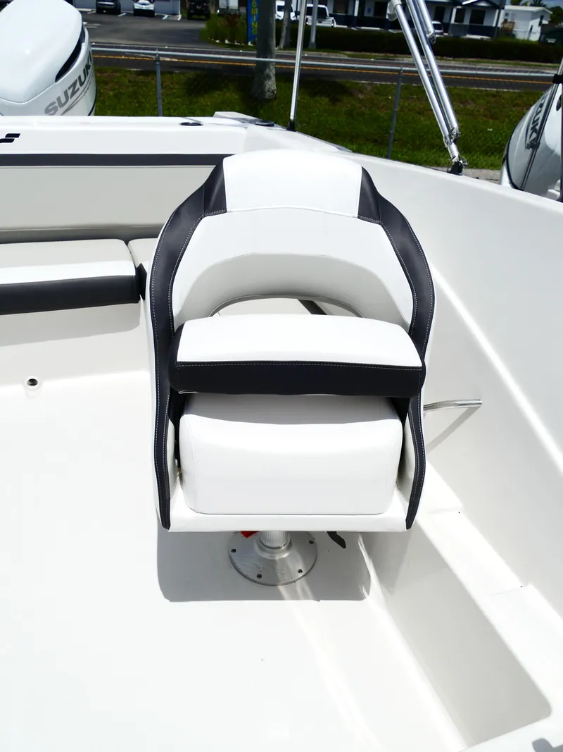 Slide: The Image of 2026 Starcraft SVX 231 OB DH boat seat, white with black accents. - 41