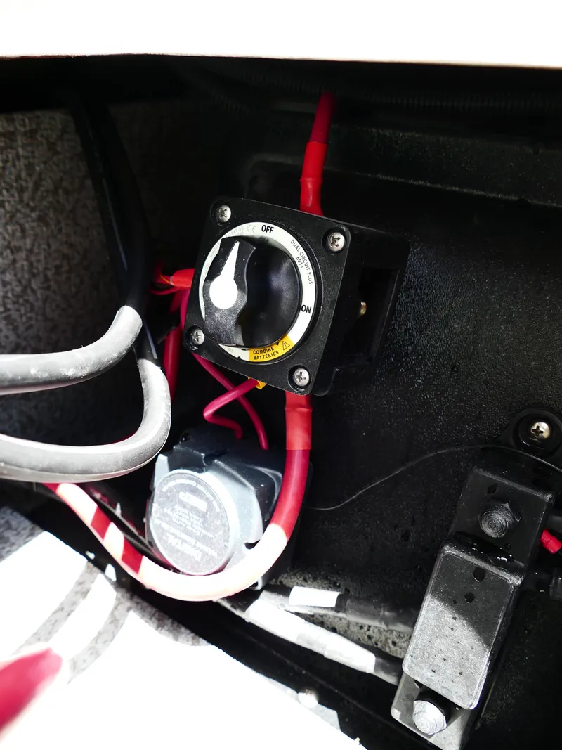 Slide: The Image of Battery switch and wiring inside a 2026 Starcraft SVX 231 OB DH boat. - 44