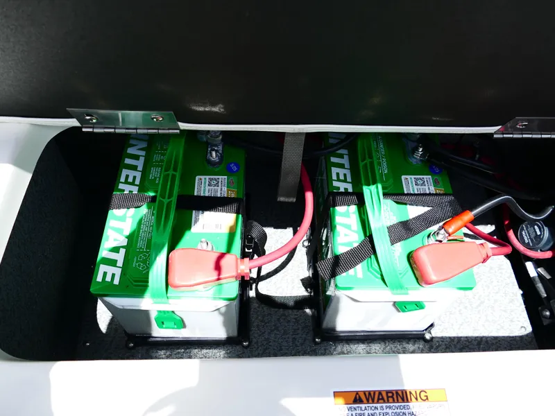 Slide: The Image of Two Interstate batteries in a 2026 Starcraft SVX 231 OB DH boat compartment. - 45