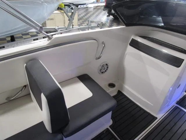 Slide: The Image of 2021 Bayliner VR4 Bowrider I/O interior with seating and sleek design. - 11