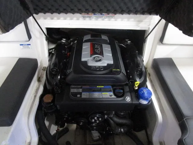 Slide: The Image of 2021 Bayliner VR4 Bowrider I/O engine compartment with detailed view of the engine. - 14