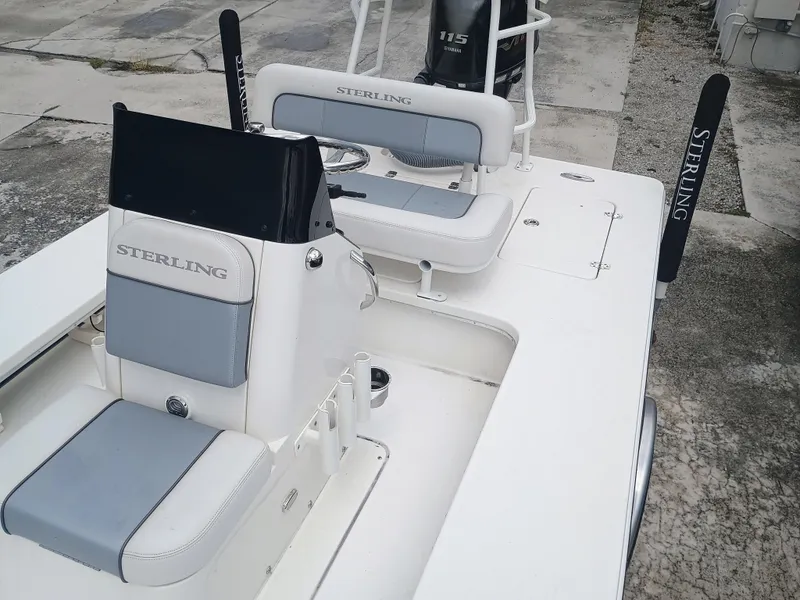 Slide: The Image of 2023 Sterling 180TS boat with dual seating and sleek design. - 15