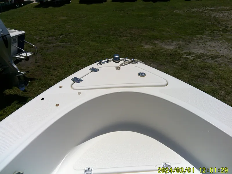 Slide: The Image of Bow of 2006 Pioneer 175 Bay Sport boat on grassy area, sunny day. - 10