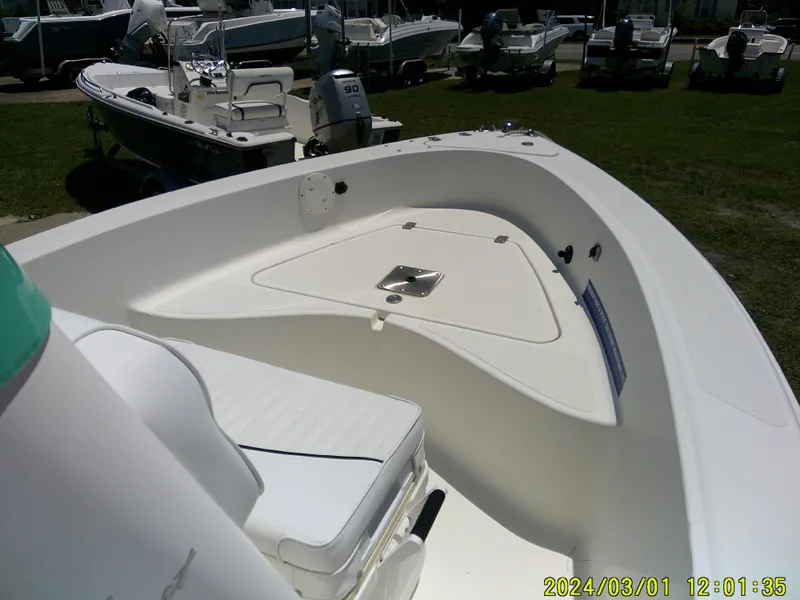 Slide: The Image of 2006 Pioneer 175 Bay Sport boat interior with seating and storage. - 11
