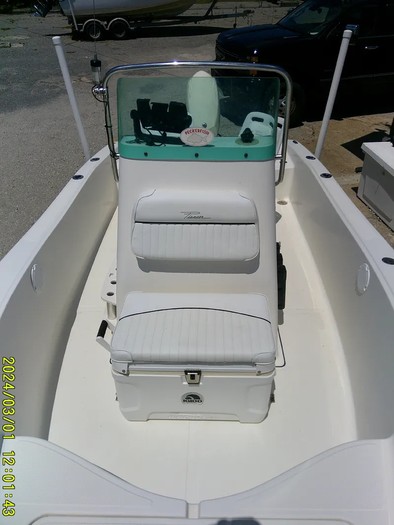 Slide: The Image of 2006 Pioneer 175 Bay Sport boat interior with seating and console. - 12