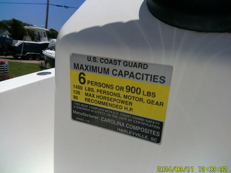 Slide: The Image of Pioneer 175 Bay Sport 2006 boat capacity label showing U.S. Coast Guard limits. - 22