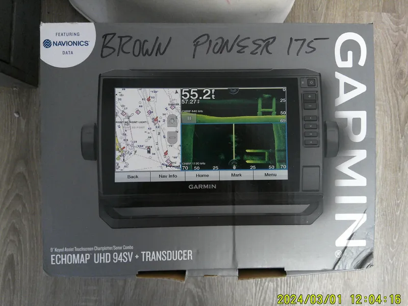 Slide: The Image of Garmin ECHOMAP UHD 94SV box with transducer, featuring Navionics data. - 24