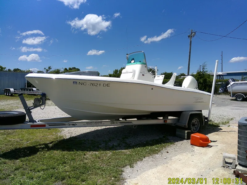 Slide: The Image of 2006 Pioneer 175 Bay Sport boat on trailer under clear blue sky. - 5