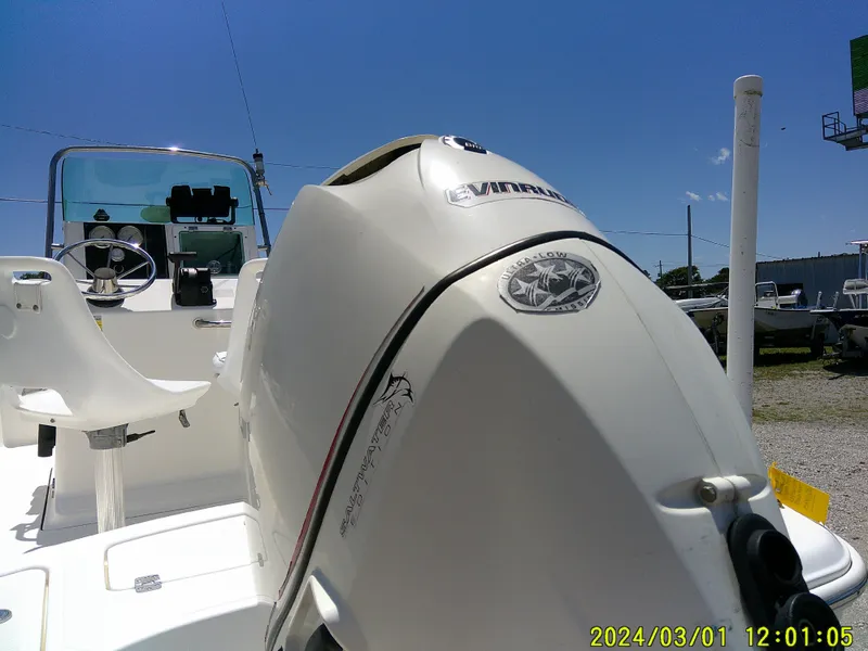 Slide: The Image of 2006 Pioneer 175 Bay Sport boat with Yamaha outboard motor under clear blue sky. - 8