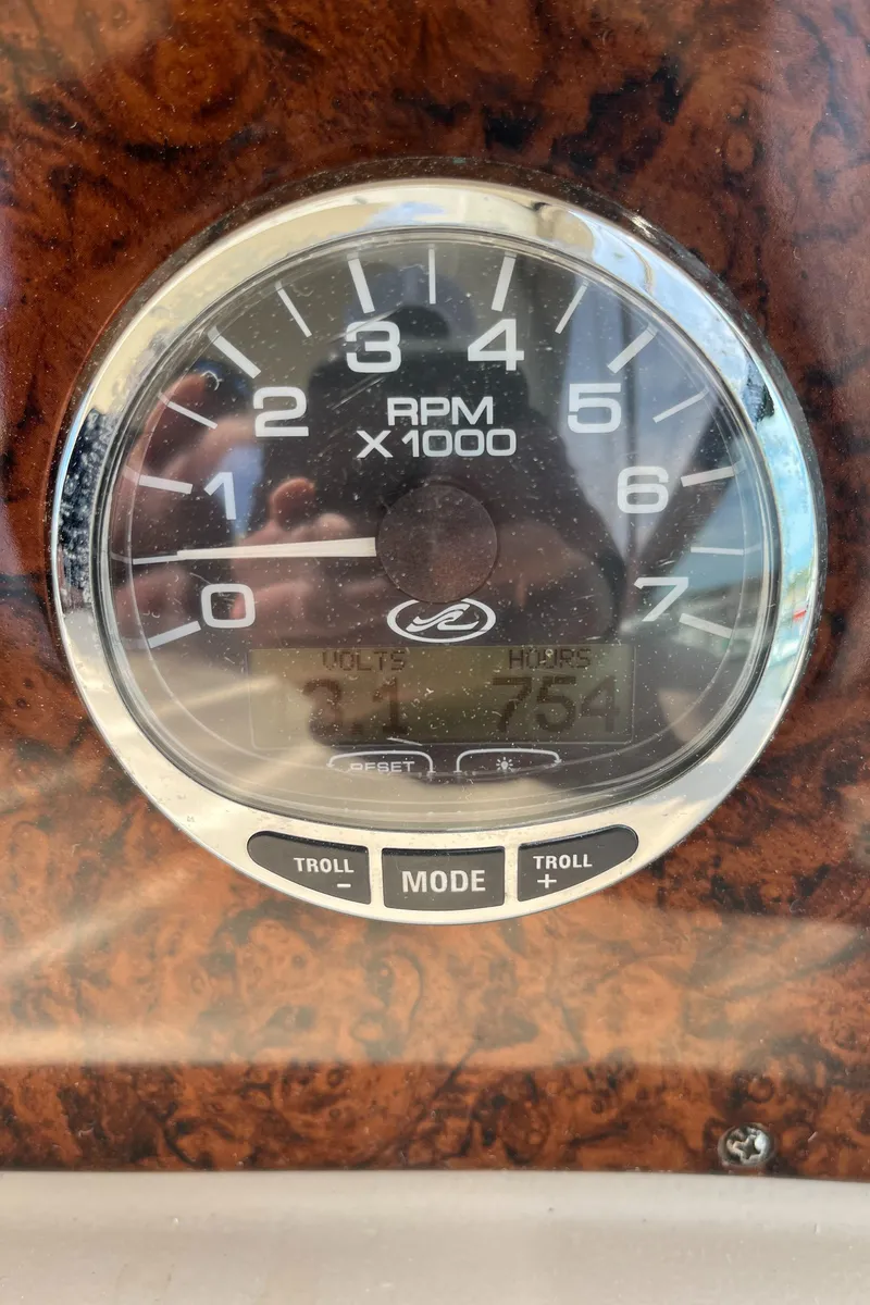Slide: The Image of Tachometer of 2005 Sea Ray 300 Sundancer showing RPM and engine hours. - 30