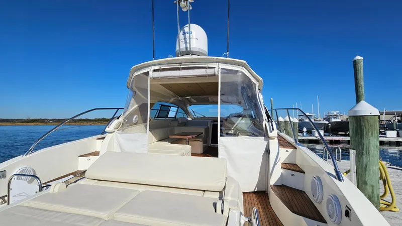 Slide: The Image of Azimut Atlantis 50 yacht, 2015 model, docked with clear blue sky background. - 17