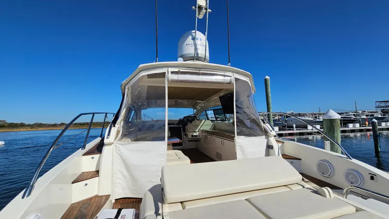 Slide: The Image of Azimut Atlantis 50 yacht, 2015 model, docked at marina under clear blue sky. - 18
