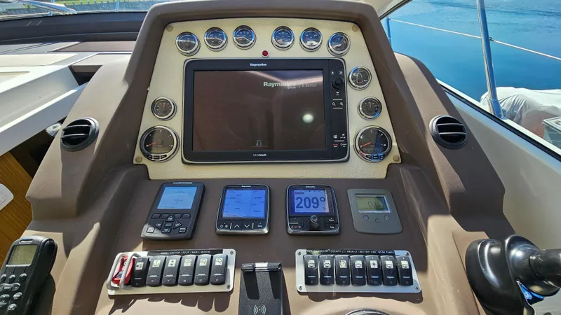 Slide: The Image of Control panel of a 2015 Azimut Atlantis 50 yacht with navigation instruments. - 23