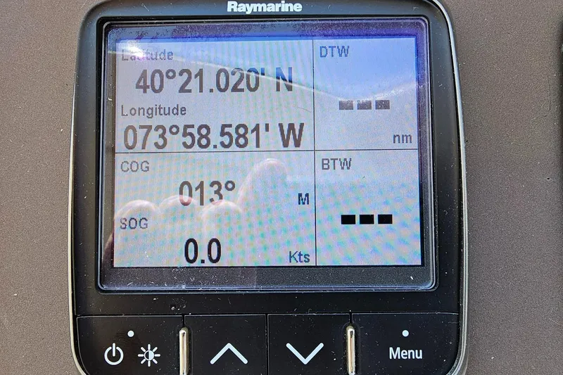 Slide: The Image of Raymarine navigation display showing coordinates on Azimut Atlantis 50, 2015 model. - 26