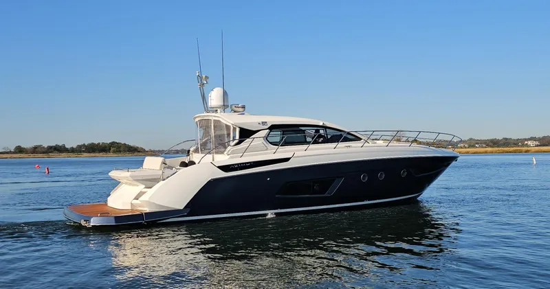 Slide: The Image of Azimut Atlantis 50 yacht, 2015 model, cruising on calm waters under a clear blue sky. - 3