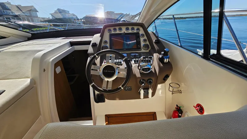 Slide: The Image of Helm of 2015 Azimut Atlantis 50 yacht with modern controls and steering wheel. - 31