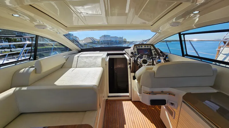Slide: The Image of Interior of 2015 Azimut Atlantis 50 yacht with luxurious seating and modern helm. - 33