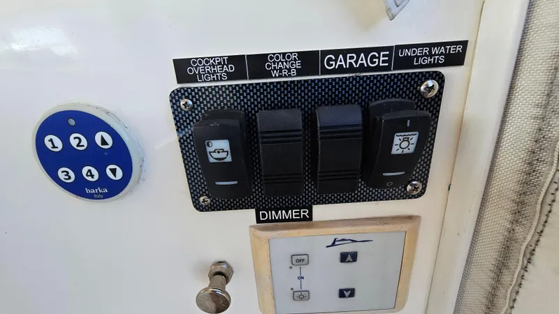Slide: The Image of Control panel on a 2015 Azimut Atlantis 50 yacht with light switches and dimmer. - 36