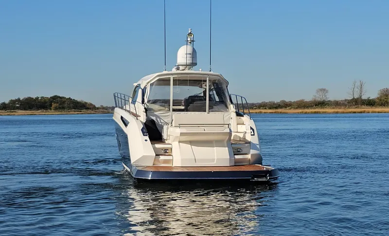 Slide: The Image of Azimut Atlantis 50 yacht, 2015 model, cruising on calm waters under a clear blue sky. - 4