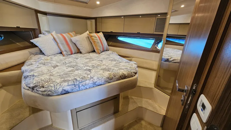 Slide: The Image of Luxurious cabin interior of 2015 Azimut Atlantis 50 yacht with cozy bedding and elegant decor. - 40