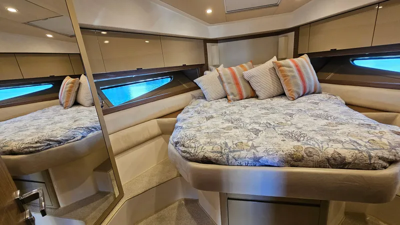 Slide: The Image of Luxurious 2015 Azimut Atlantis 50 yacht cabin with cozy bed and elegant decor. - 41