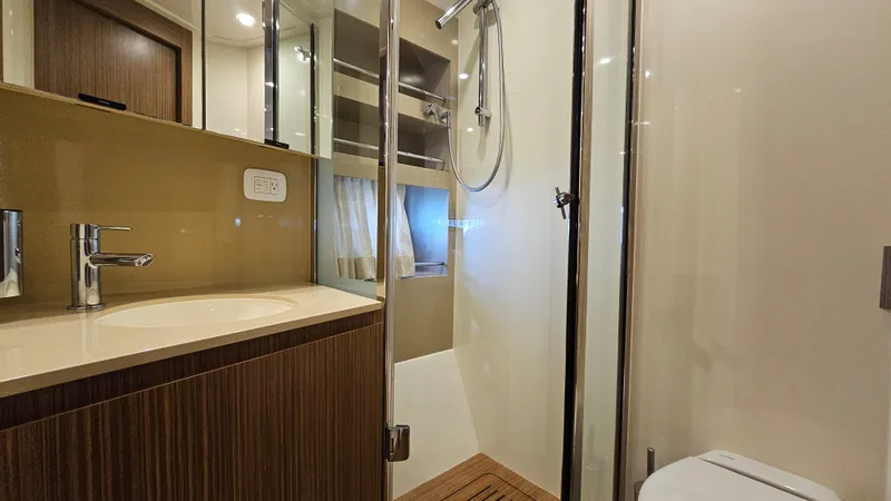 Slide: The Image of Luxurious bathroom in 2015 Azimut Atlantis 50 yacht with modern fixtures and shower. - 43