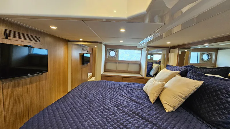 Slide: The Image of Luxurious bedroom interior of 2015 Azimut Atlantis 50 yacht with cozy bedding and modern decor. - 47