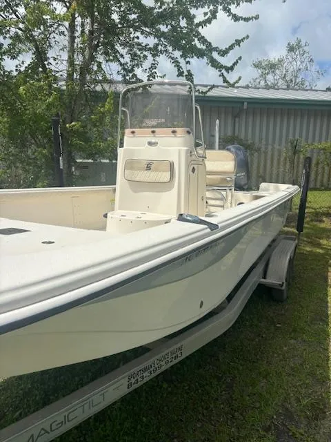 Slide: The Image of 2021 Carolina Skiff 23 LS boat on trailer, parked outdoors. - 8