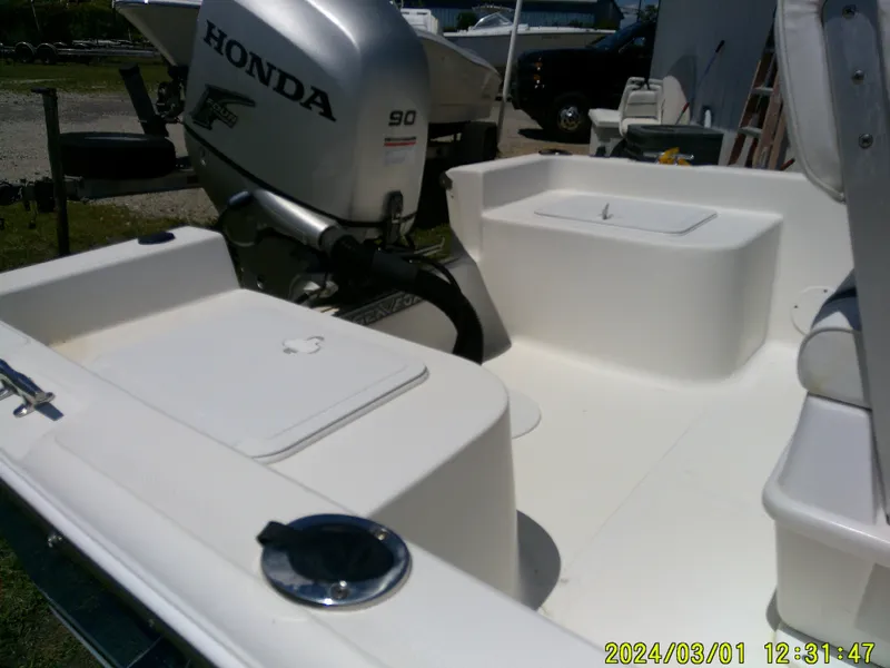 Slide: The Image of 2011 Sea Fox 172 CC boat with Honda 90 outboard motor, rear deck view. - 13
