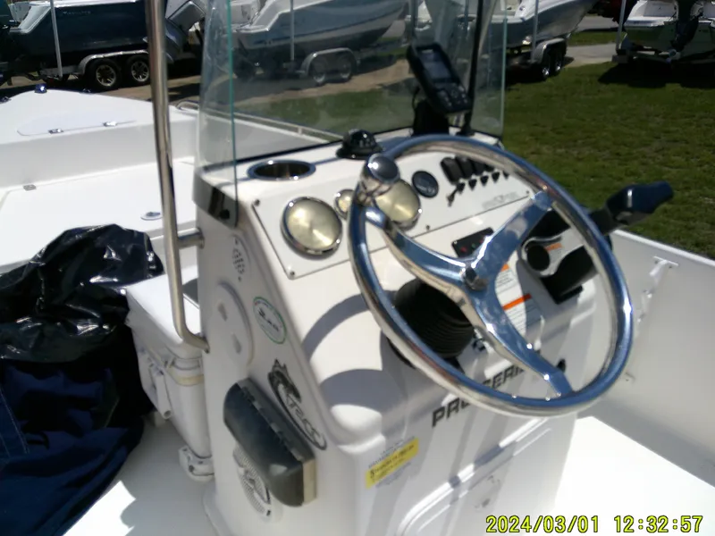 Slide: The Image of 2011 Sea Fox 172 CC boat dashboard with steering wheel and gauges. - 20